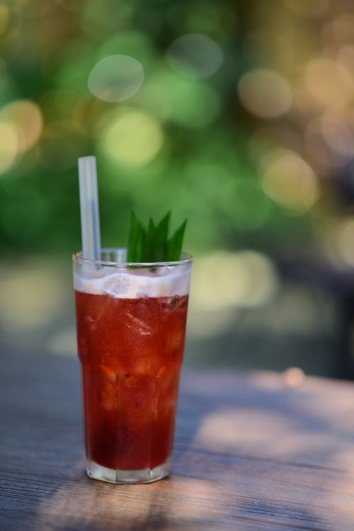 Unbranded herbal drink on an outdoor table